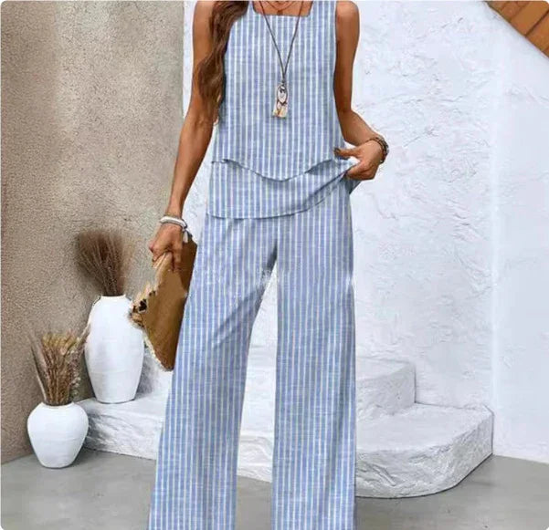 Woman wearing blue and white striped sleeveless wide leg pants set, relaxed fit, lightweight fabric