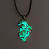 Glow in the dark dragon pendant necklace with metallic finish and black cord, futuristic streetwear accessory