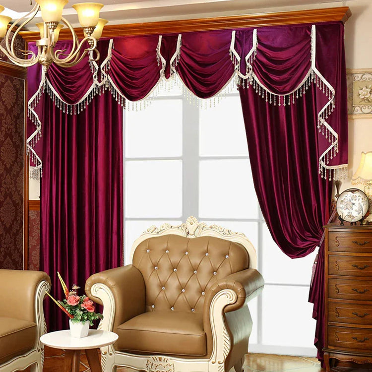 Elegant living room with deep burgundy velvet curtains and ornate tufted armchair