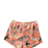 Fuzzy peach shorts with ghost and skeleton print, relaxed fit, soft fleece material