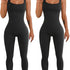 Black ribbed sleeveless jumpsuit with scoop neck, fitted stretch fabric, full-length legs