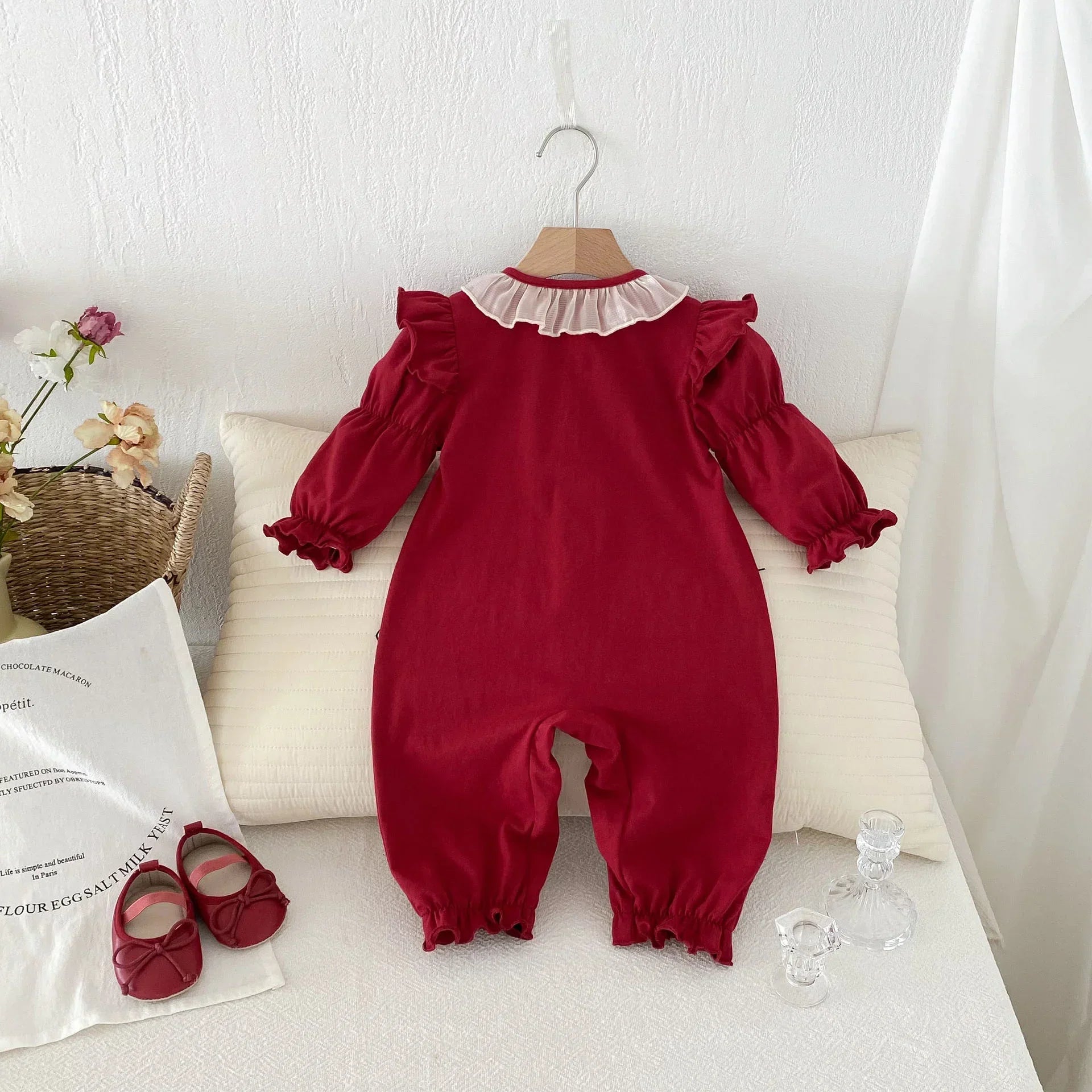 Red ruffle long sleeve baby jumpsuit with white collar, soft cotton material, loose fit