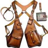 Vintage brown leather shoulder holster harness set with matching wallet and keychain, adjustable fit