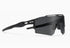 Futuristic black wraparound sunglasses with large tinted lens and angular design, sporty fit