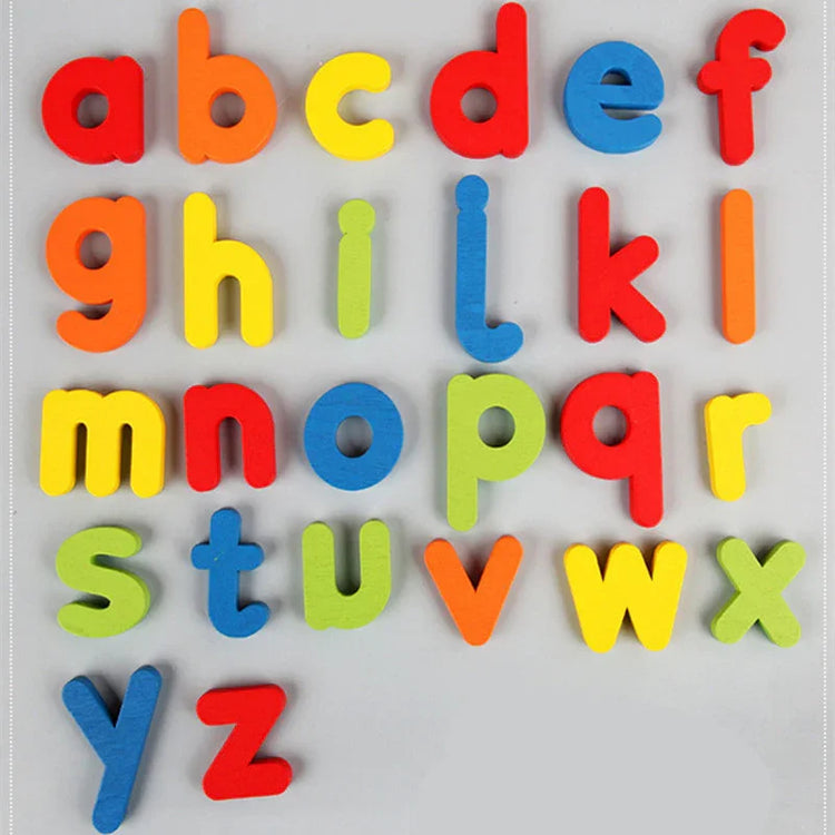 Colorful foam lowercase alphabet letters on a light background, educational toy.