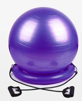 Purple stability balance ball with resistance bands, textured surface, fitness equipment.