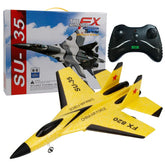 Yellow and black SU-35 remote control stunt plane with black controller and packaging