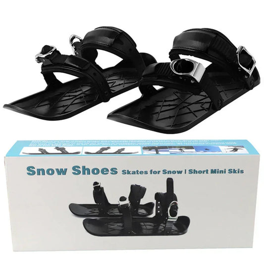 Black plastic snow shoes with adjustable straps, short mini ski design for snow skating.