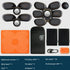 Black and orange electronic muscle stimulator set with gel pads, charging cable, and accessories.