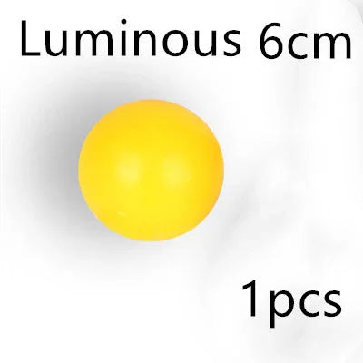 Yellow luminous ball, 6cm size, smooth surface, photographed on white background