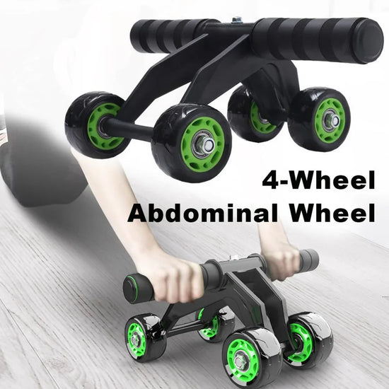 Black and green four-wheel ab roller with foam handles for core workouts on wood floor