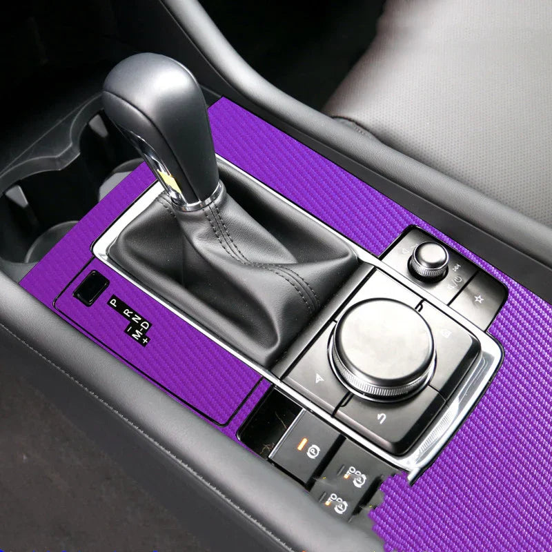 Purple carbon fiber style car interior trim wrap on center console and gear shift area