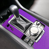 Purple carbon fiber style car interior trim wrap on center console and gear shift area