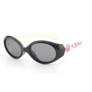 Black oval sunglasses with white arms and pink cartoon accents, glossy plastic frame