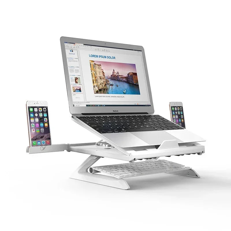 Adjustable white laptop stand with slots for smartphones and keyboard, modern desk accessory