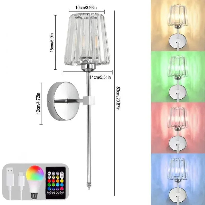 Modern silver wall sconce with clear acrylic shade, adjustable RGB lighting, remote control, and USB charger shown.