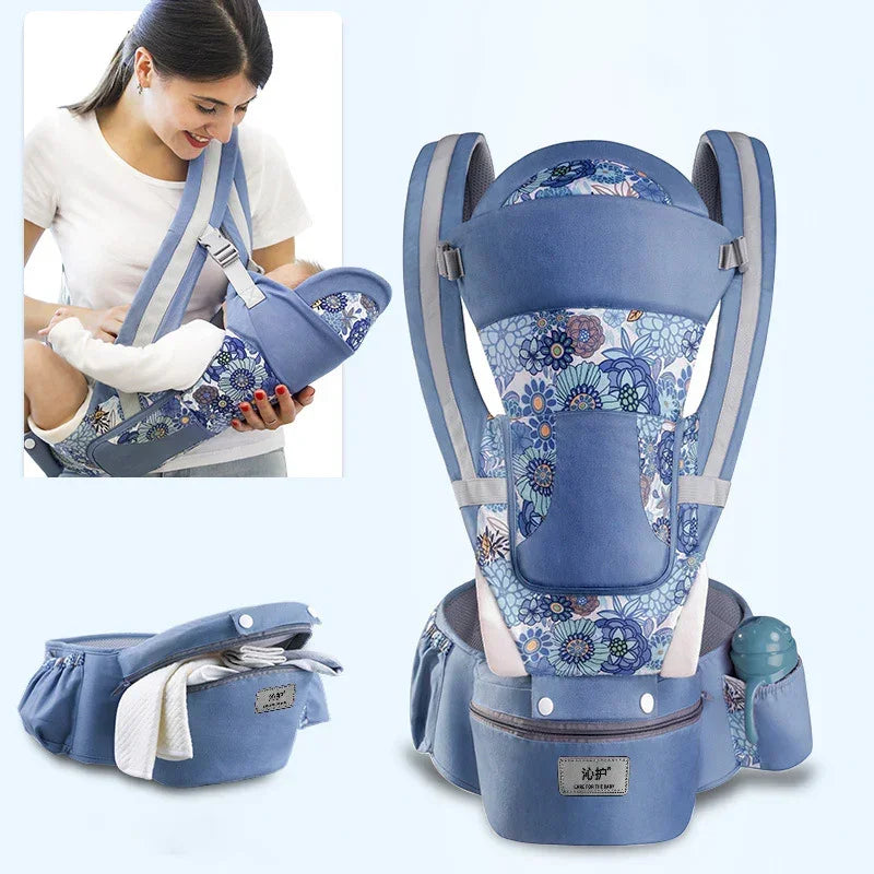 Blue floral baby carrier with adjustable padded straps and storage pockets, ergonomic fit