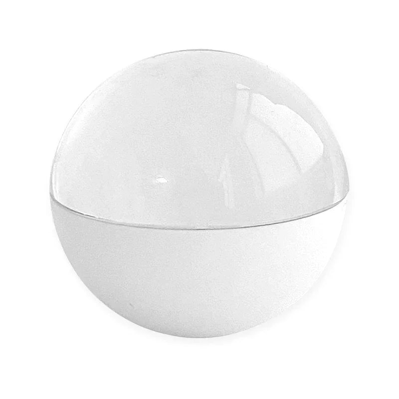 Minimalist white spherical container with a glossy transparent lid, modern design