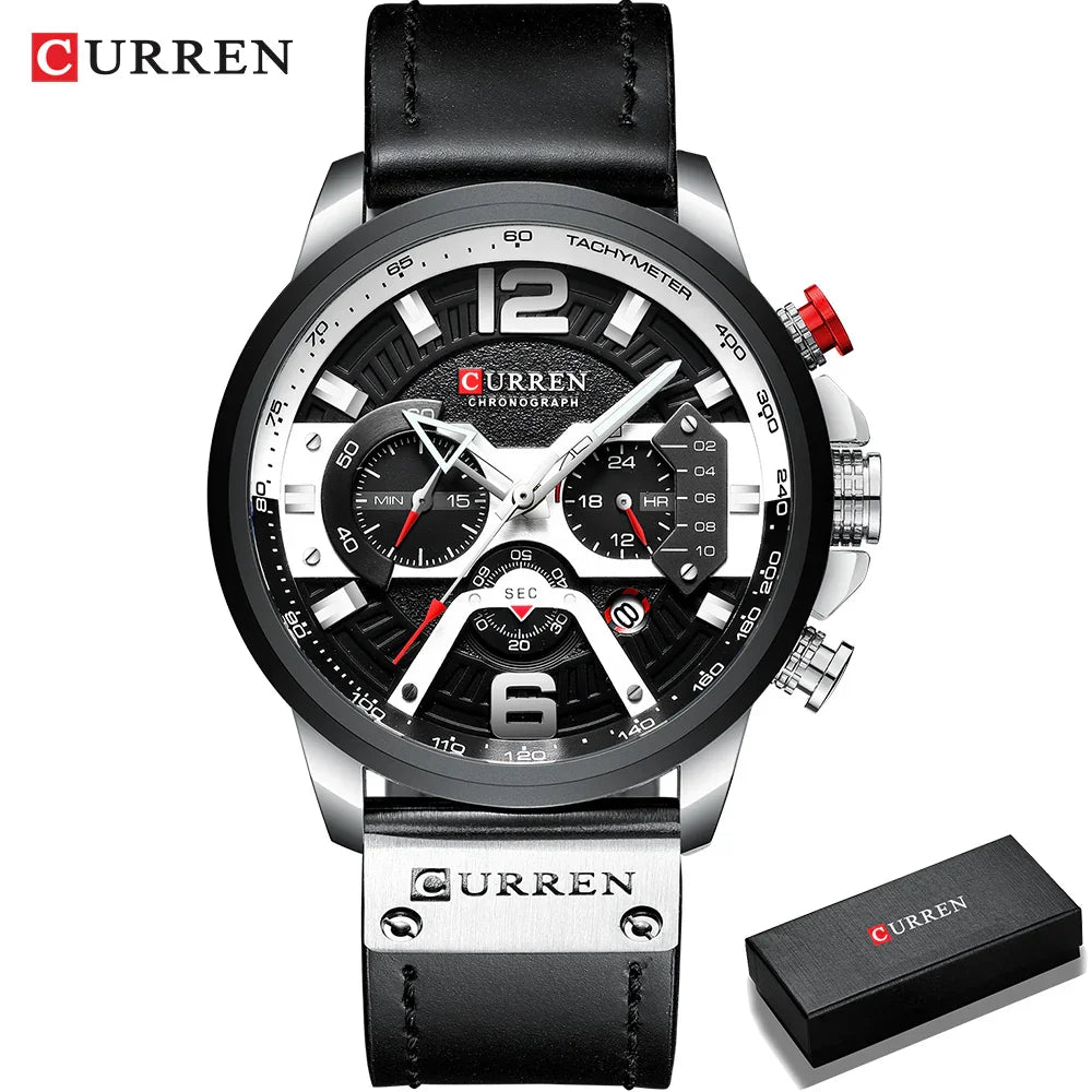 Black and silver chronograph wristwatch with leather strap, bold dial, and metallic details