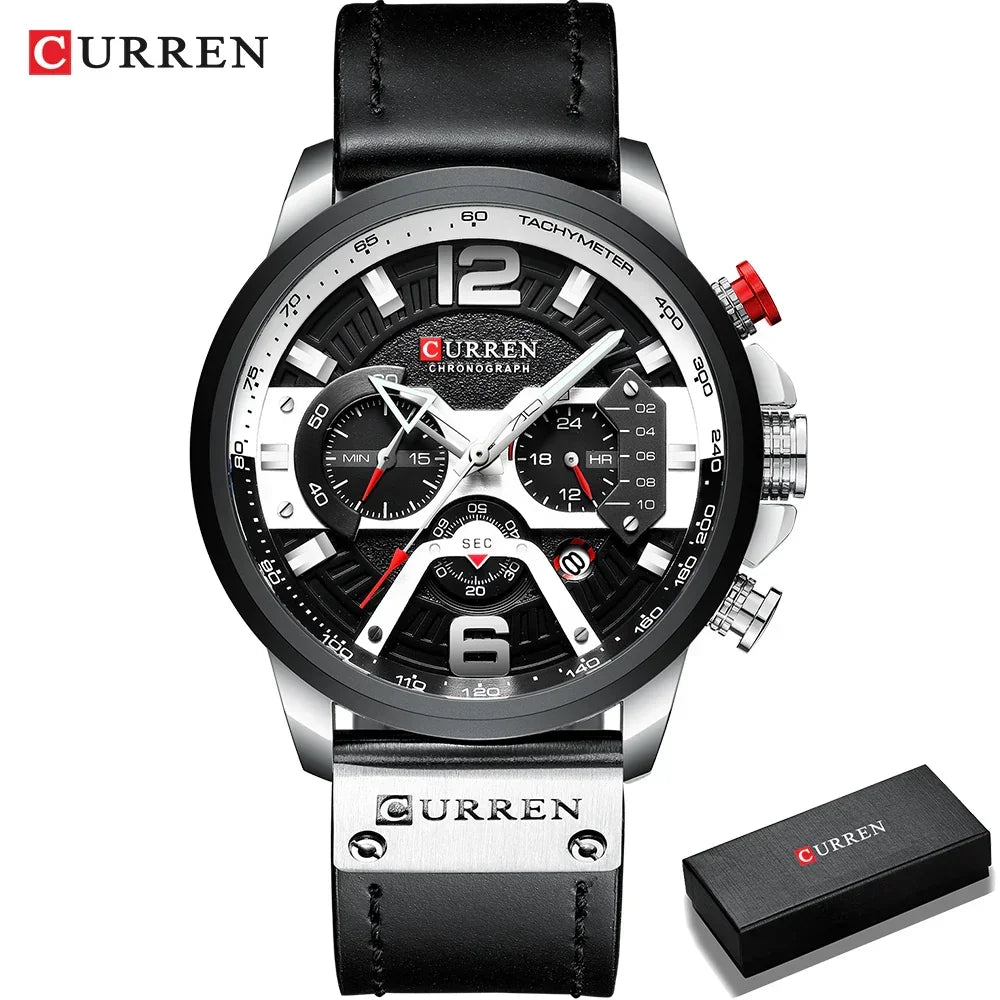 Black and silver chronograph wristwatch with leather strap, bold dial, and metallic details