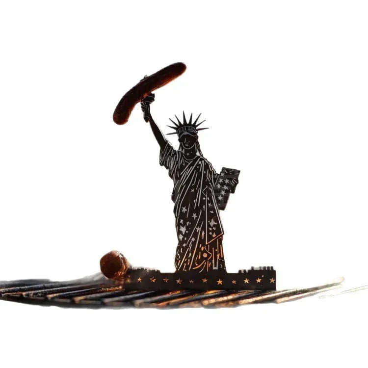 Metal silhouette of Statue of Liberty holding a sausage, white background, novelty decor