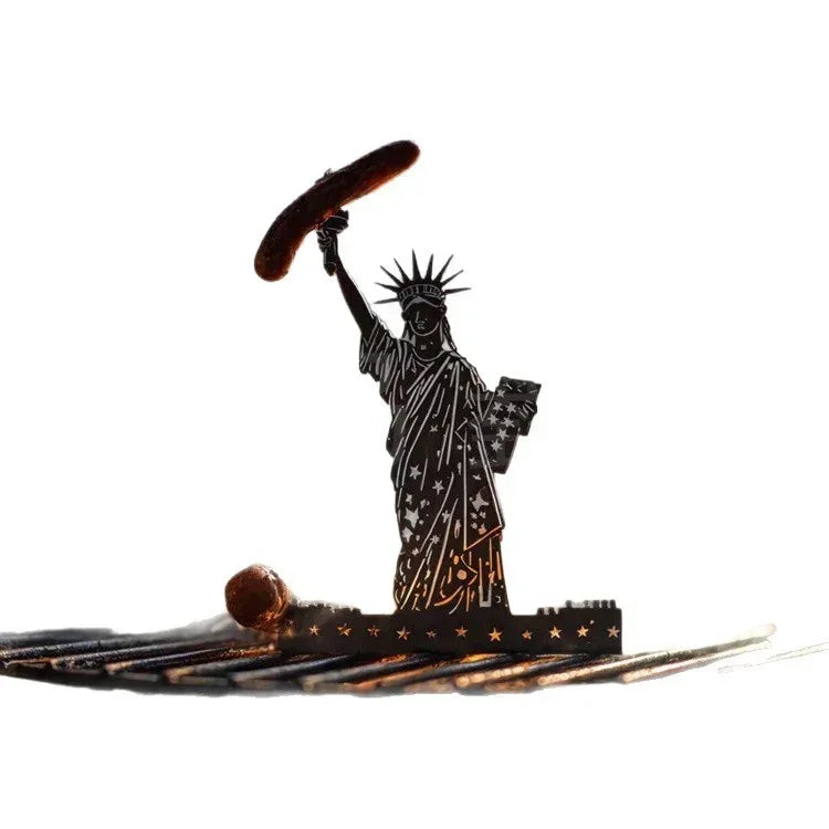 Metal silhouette of Statue of Liberty holding a sausage, white background, novelty decor