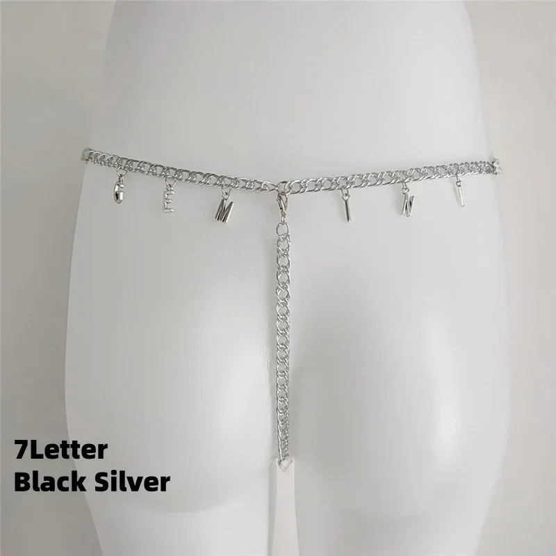 Silver chain waist belt with hanging letter charms, adjustable fit, styled on mannequin