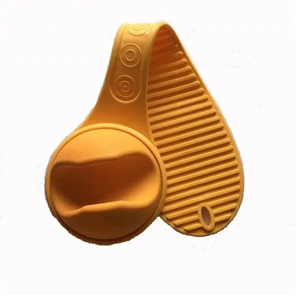Yellow silicone scrubber with textured surface and ergonomic hand grip