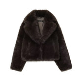 Black faux fur jacket with wide lapel collar, long sleeves, and relaxed fit