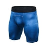 Blue geometric pattern compression shorts with black waistband, form-fitting athletic wear