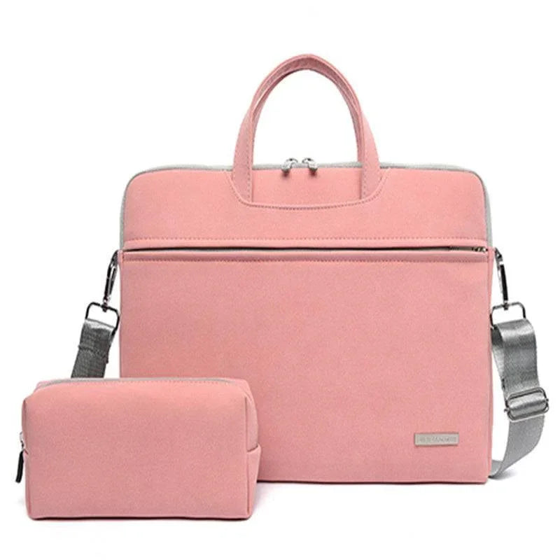 Pink canvas laptop bag with matching pouch, silver zippers, and adjustable grey strap