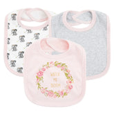 Set of three soft cotton baby bibs, pastel colors, floral print, elephant pattern, pink and grey.