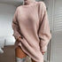 Oversized ribbed knit turtleneck sweater dress in light beige with relaxed fit and long sleeves.