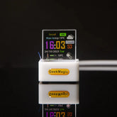 Mini transparent digital desk clock with colorful weather display, white plastic base, modern tech accessory