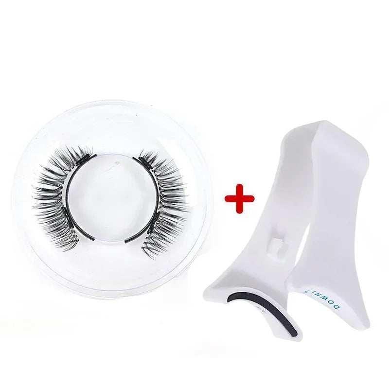 Black false eyelashes with clear round case and white plastic applicator tool