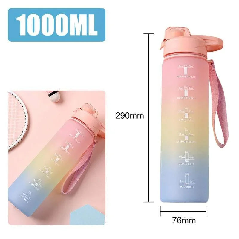 Gradient pastel 1000ml water bottle with time markers, pink strap, plastic material, slim fit.