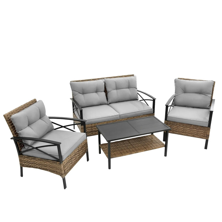 Four-piece outdoor patio set with gray cushions, rattan weave, black metal frame, includes coffee table