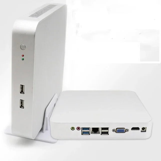 Sleek white mini desktop computer with multiple USB ports and compact design
