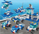 Blue and white plastic police toy brick set with vehicles and SWAT station on display