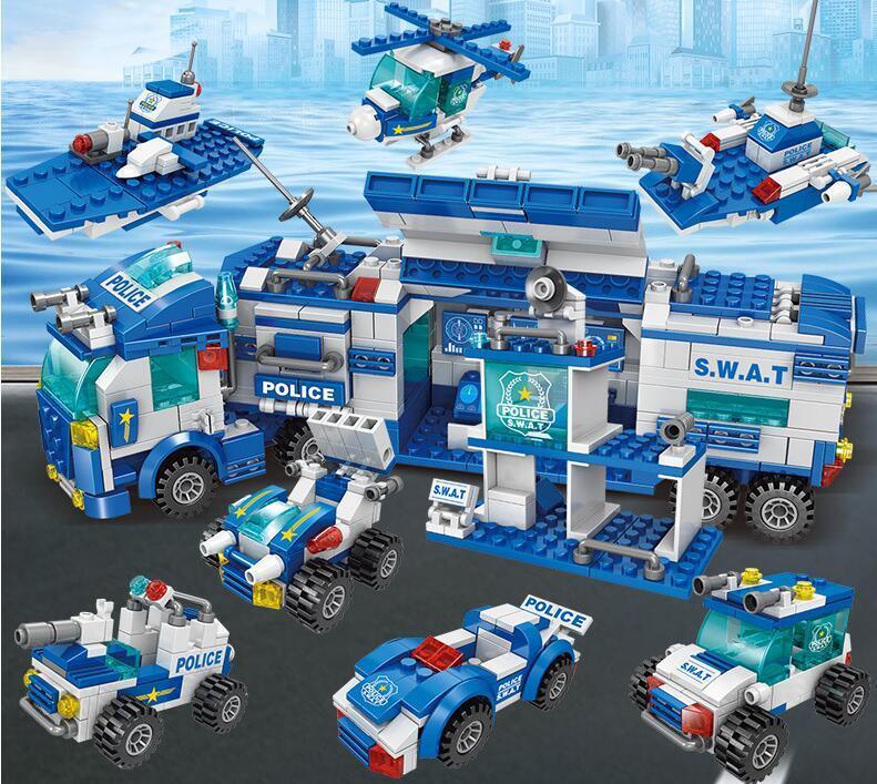 Blue and white police SWAT building block vehicles and helicopter toy set on city background