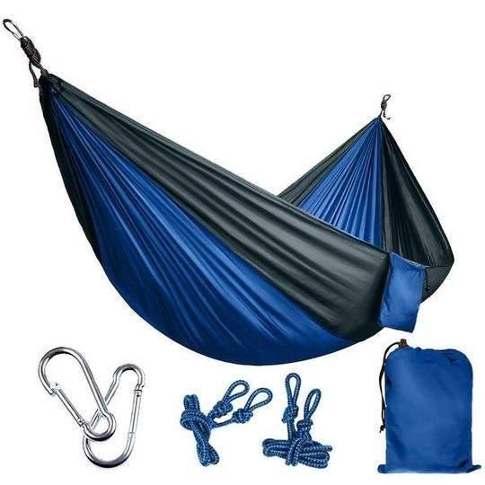 Blue and black nylon hammock with carabiners, ropes, and a matching carry bag