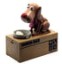Brown plastic dog coin bank with animated dog figure on beige box labeled &