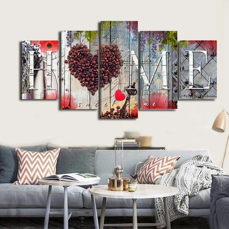 Modern living room with light gray sofa, decorative pillows, and colorful wall art spelling &