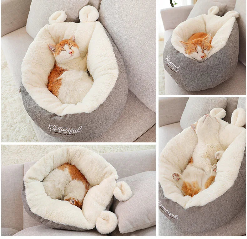 Soft, plush grey and white pet bed with cozy faux fur lining, cradling a sleeping cat.