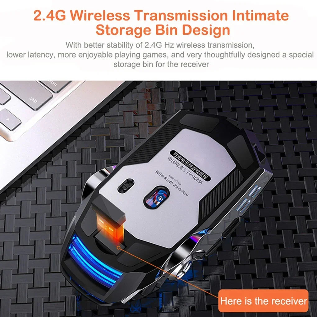 Futuristic black and silver wireless gaming mouse with LED accents and storage bin for receiver