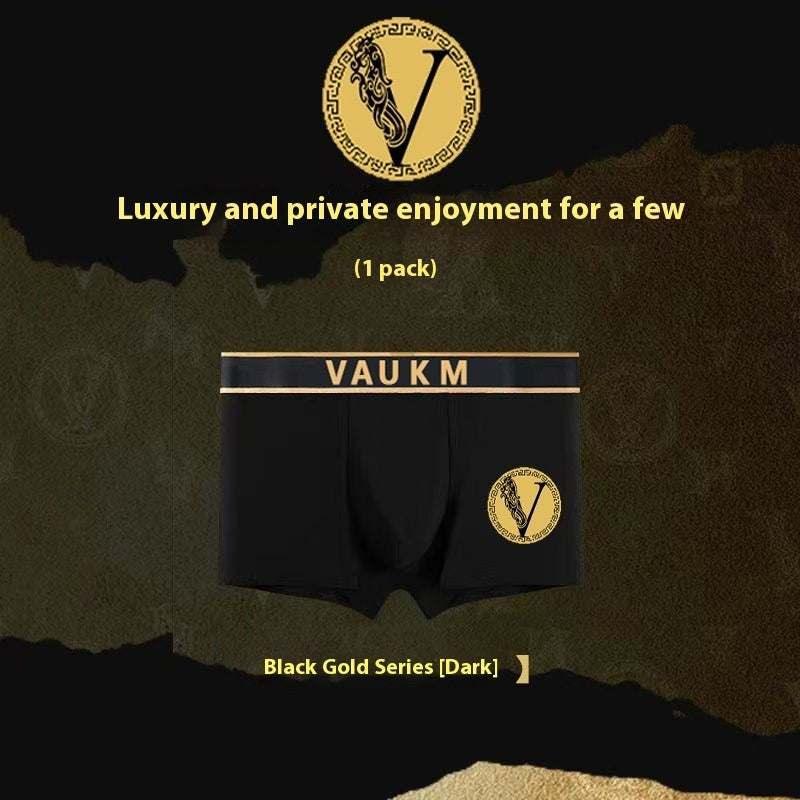Black and gold men's boxer briefs, snug fit, premium fabric, luxury streetwear style.