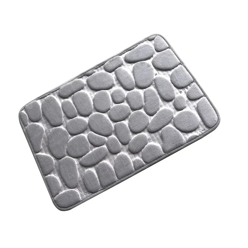 Gray pebble-patterned rectangular bath mat, soft fabric, plush texture, modern style