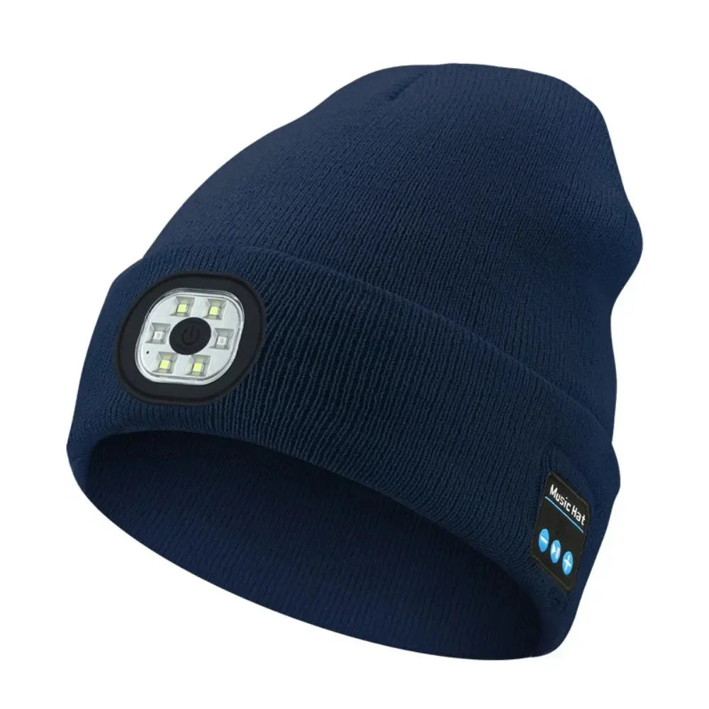 Navy blue knit beanie with built-in LED light and visible tech panel, unisex streetwear style