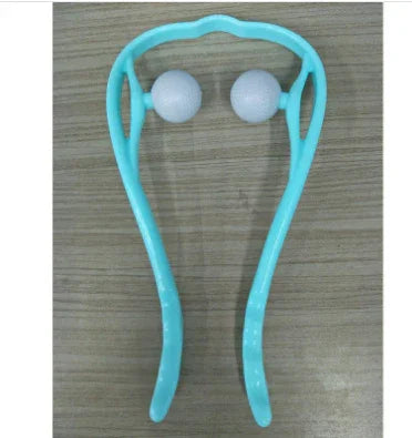 Light blue plastic handheld neck massager with dual white rollers on a wood surface