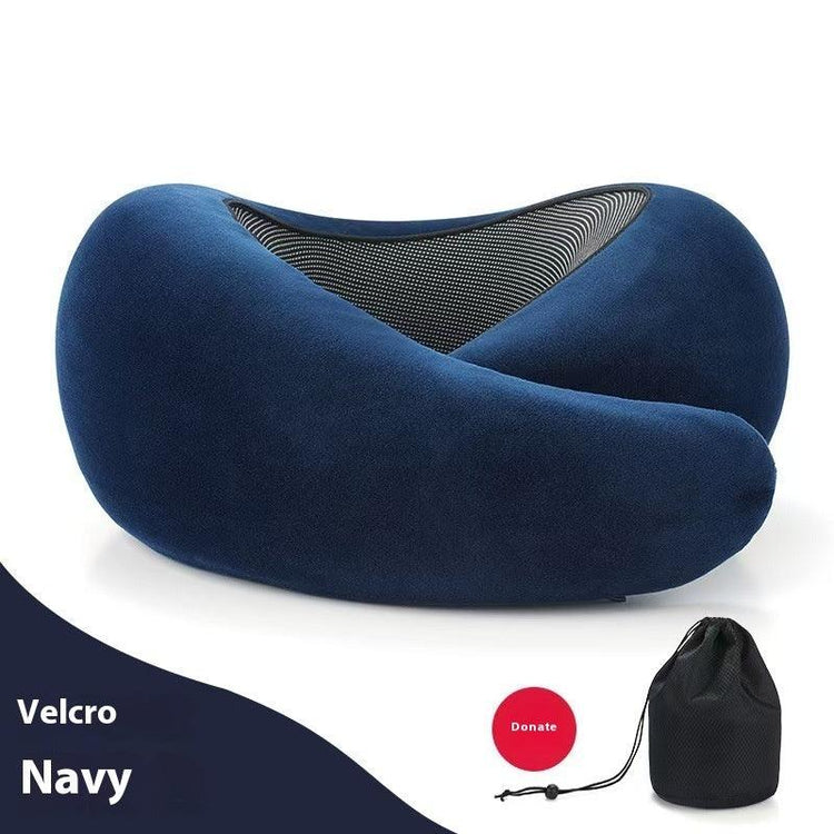 Navy blue memory foam travel neck pillow with mesh panel, soft fabric, ergonomic fit, includes storage bag.